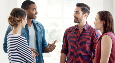 Group of young professionals talking